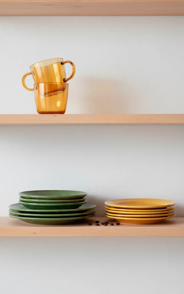 10 vertical realistic photo of open shelving displaying a stack of amber glass coffee mugs and retro stonew 01 filled 640x1024