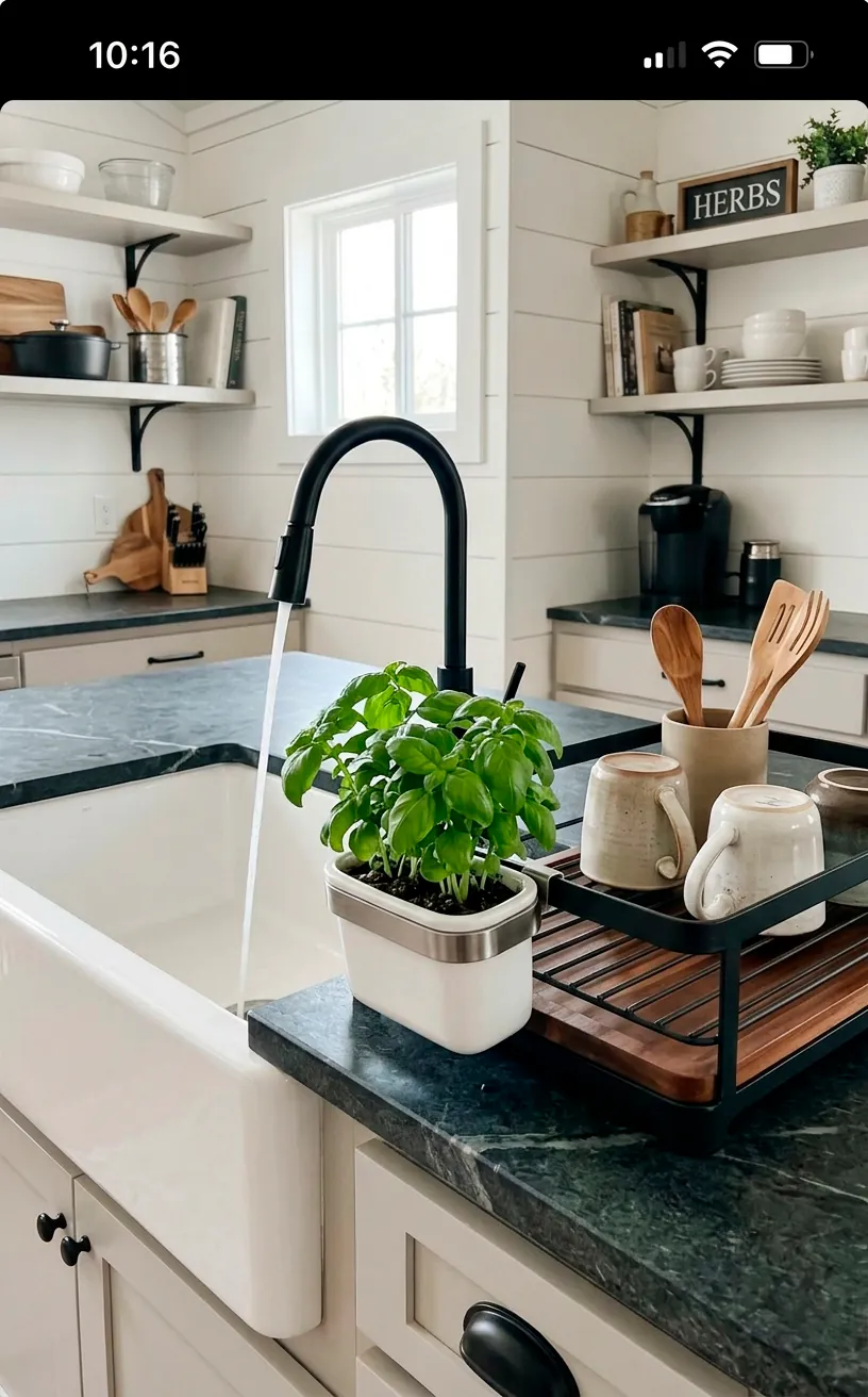 Discreet integrated sink side planter growing fresh basil in a modern kitchen.